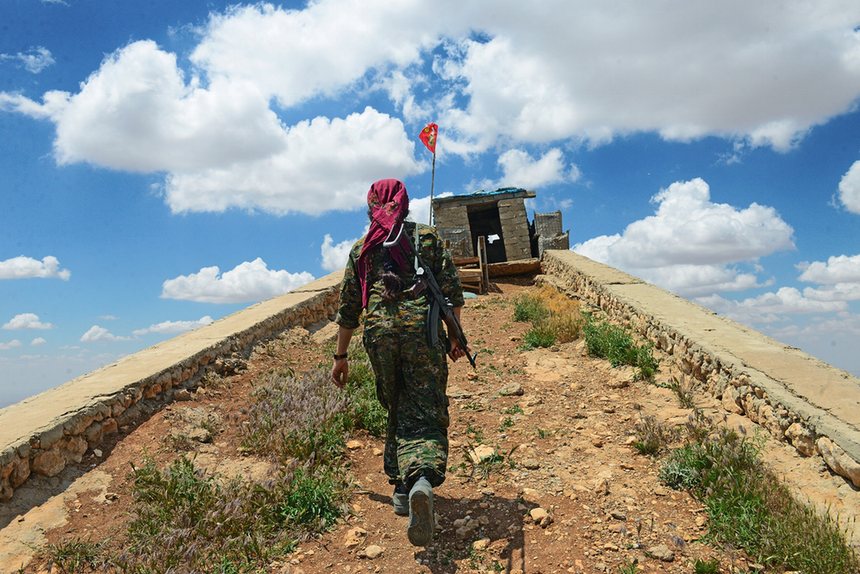 Yazidi woman sky...