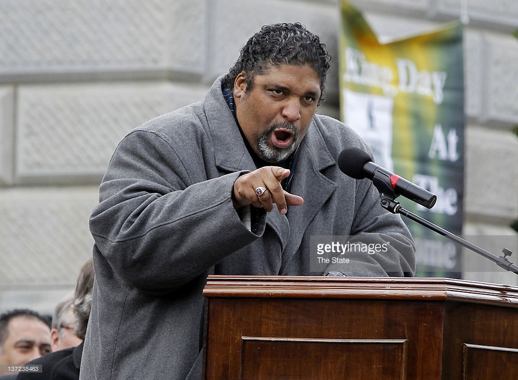 The Rev. Dr. William Barber II, president of the North Carolina chapter of the NAACP, addresses the crowd during the annual King Day at the Dome rally at the State House, Monday, January 16, 2012. The event featured a service at Zion Baptist Church and a march down Main Street towards the capitol. (Gerry Melendez/The State/MCT)